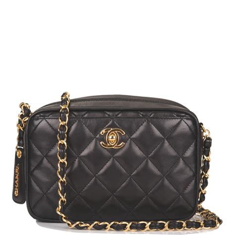 chanel quilted camera bag.